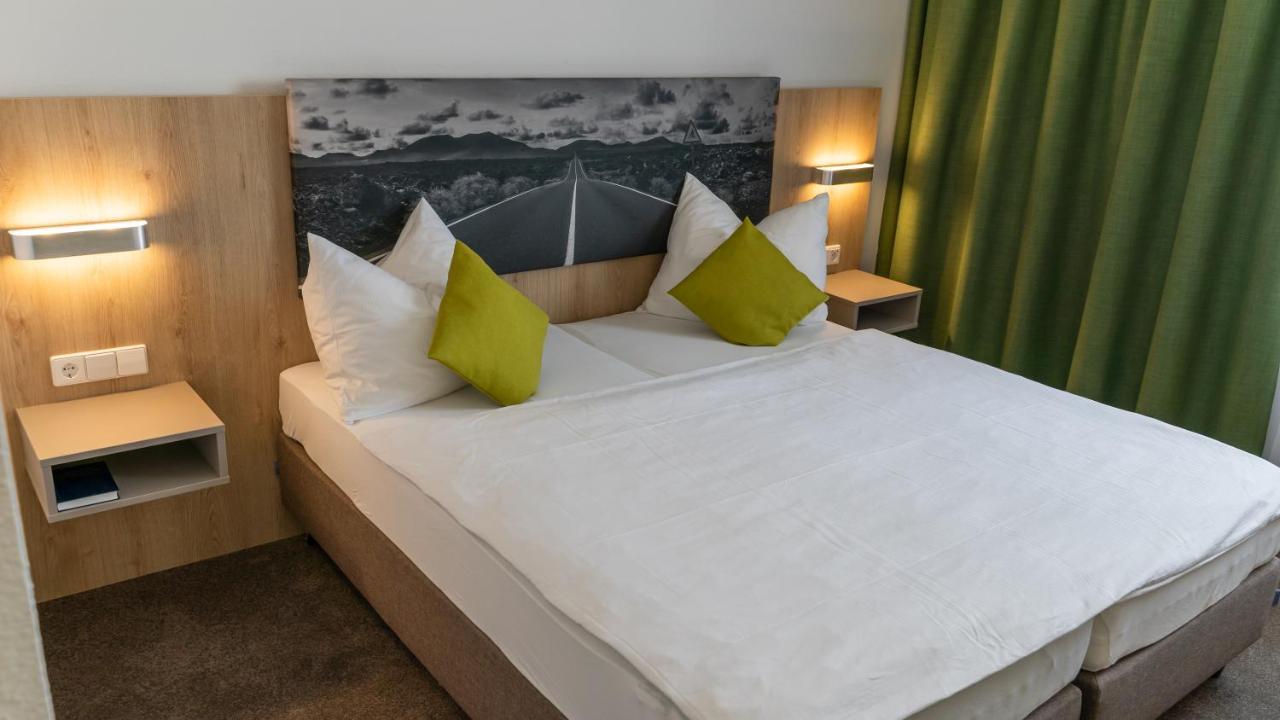 Highway Hotel Херболцхайм Екстериор снимка